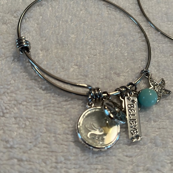 Silver toned bracelets with charms - Picture 3 of 3